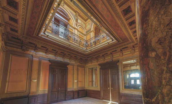 Magnificent staircase with ceiling fresco, framed by columns and elegant wooden doors, Villa Woodstock, Lost Place, Brill, Wuppertal, North Rhine-Westphalia, Germany