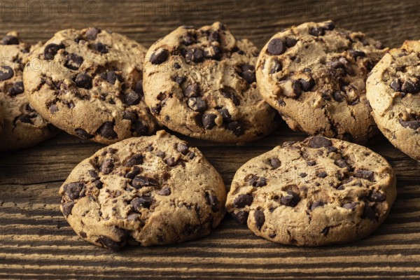 Chocolate chip cookies on wooden table