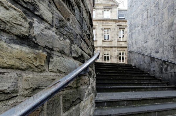 Staircase passage with railings in the historic city centre of Cologne