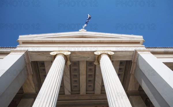 Exterior roof details and columns of Athens university building entrance