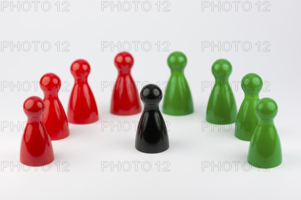Conceptual game pawns that depict the concept different