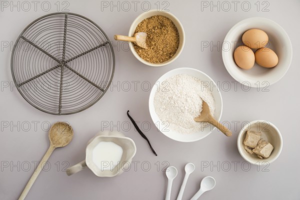 Collection of ingredients and for baking on a light-coloured surface