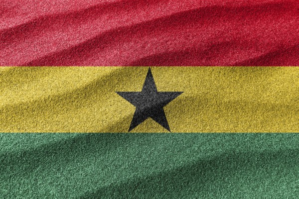 Ghana sand flag, national flag sand background
