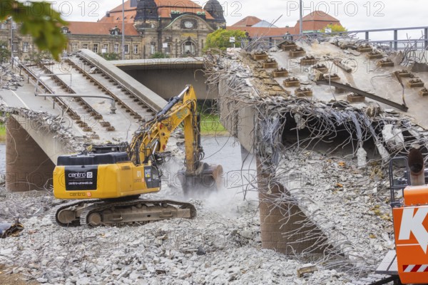 After the collapse of parts of the Carola Bridge, demolition work began on the Old Town side. The bridge sections on the Old Town side were dismantled using heavy machinery, Carola Bridge in Dresden, Dresden, Saxony, Germany