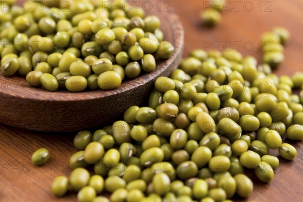 Mung beans over wooden spoon, lodz, poland