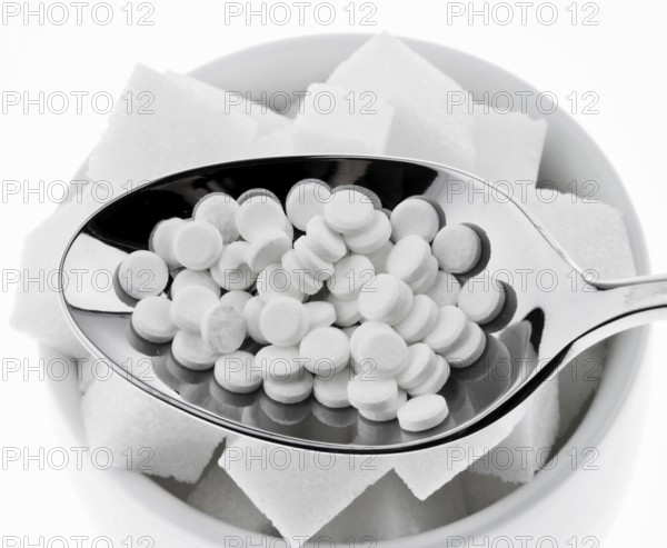Low calorie sweetener and sugar cubes. Symbol for calories and diet, Austria