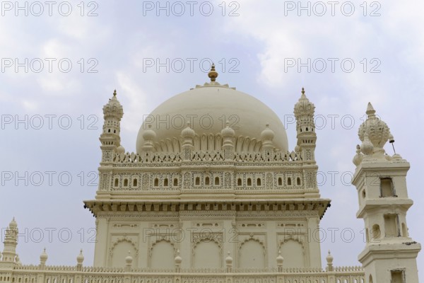 Mysore, Karnataka, South India, India, Asia, A detailed dome rises majestically against a cloudy sky