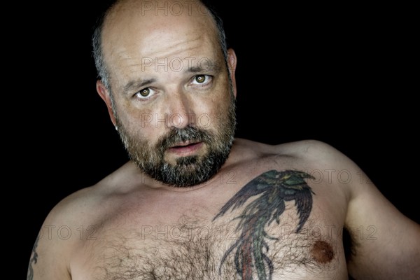 An image of a handsome man with a beard