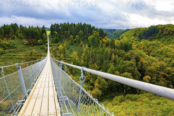 The magnificent Geyerlei is the longest suspension cable bridge in Germany. Hunsrück region in Rhineland-Palatinate. Windy and cold autumn day