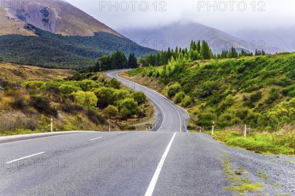 Picturesque road along the Pacific coast to Pancake Rock. West Coast of the South Island of New Zealand. Incredible journey to the ends of the world. The concept of ecological, active and photo tourism