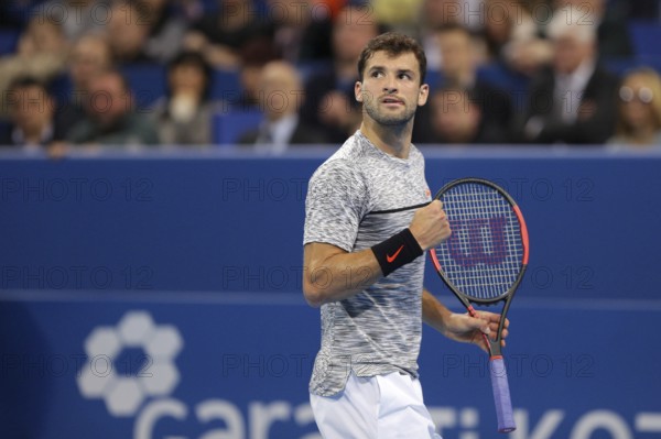Sofia, Bulgaria - February 12, 2017: Grigor Dimitrov (pictured) from Bulgaria plays against David Goffin from Belgium during the final match from Sofia Open 2017 tennis tournament