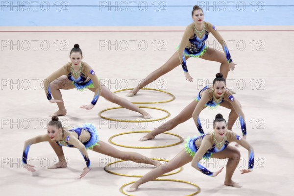 Sofia, Bulgaria - 30 March, 2018: Team Slovenia performs with hoops during Rhythmic Gymnastics World Cup Sofia 2018. Group tournament