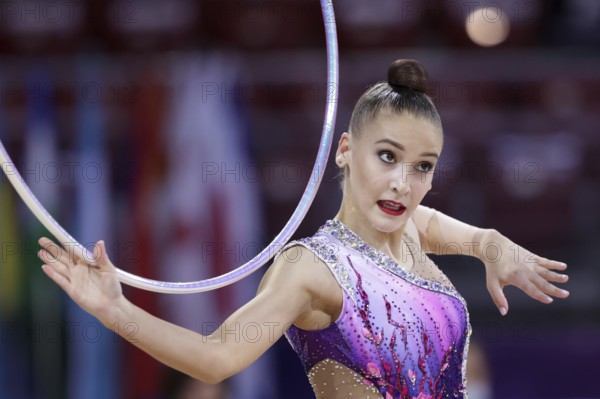 Sofia, Bulgaria - 27 March, 2021: Sabina Tashkenbaeva of Uzbekistan performs during the individual Hoop final at the 2021 Rhythmic Gymnastics Sofia World Cup, Sofia, Bulgaria