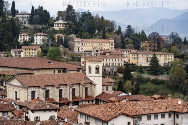 Red tiled roofs of old houses. Bergamo, Italy.