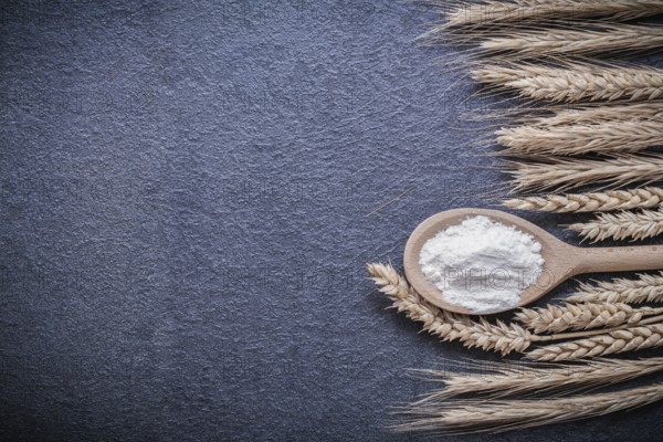 Wooden spoon flour wheat rye ears horizontal version
