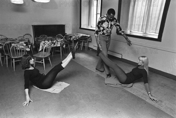 The pop group ABBA. Its two female members Anni-Frid Lyngstad and Agnetha Fältskog practice and train in preparation for the upcoming folk park tour in 1975. Choreographer Graham Tainton leads the exercises. He was a choreographer for Abba. 1975