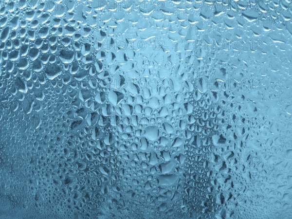 Water drops on glass close up