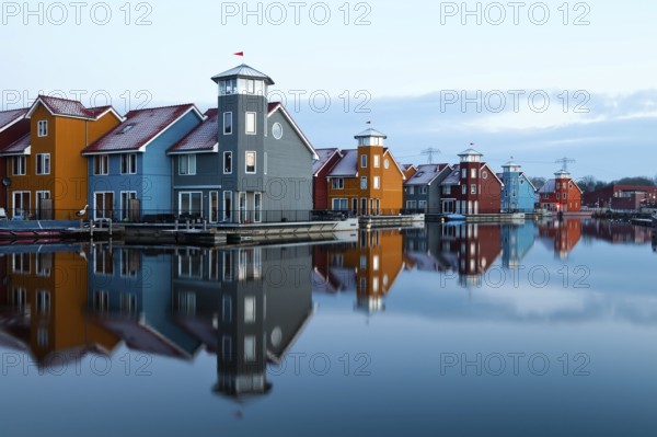 Colorful buildings on water at Reitdiephaven in Groningen, Netherlands