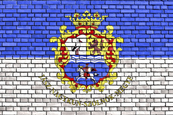 Flag of Jasz-Nagykun-Szolnok County painted on brick wall
