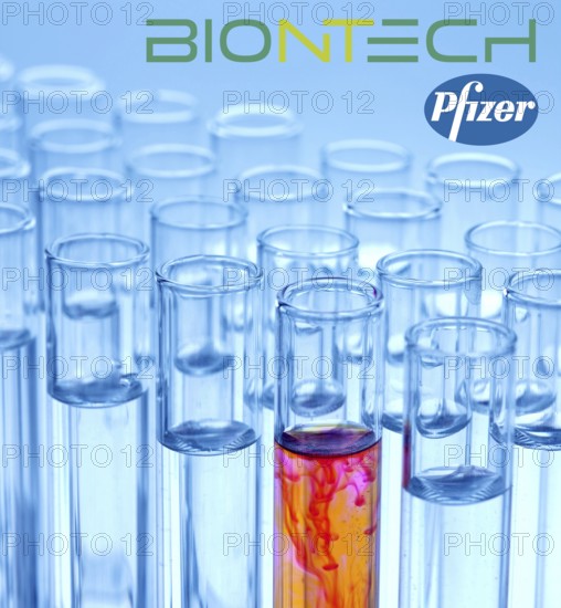 A single syringe, corona vaccine from Biontech and Pfizer, logo, test tubes, laboratory examination studio photo, Lower Saxony, Federal Republic of Germany