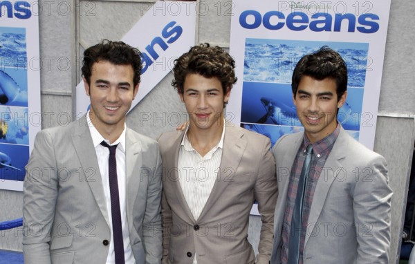 Nick Jonas, Kevin Jonas and Joe Jonas of The Jonas Brothers at the Los Angeles premiere of 'Oceans' held at the El Capitan Theater in Hollywood, USA on April 17, 2010, Hollywood, California, USA