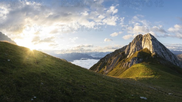 Mountain Predigstein in the Mountain range Wetterstein range in Tyrol Austria at sunrise. panorama