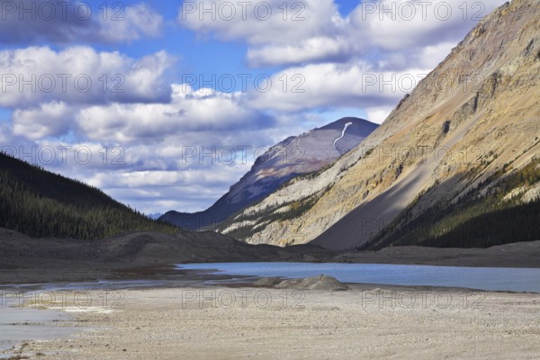 Shallow lake in mountains of Canada in the autumn