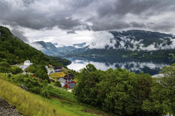 Beginning of the Hardangerfjord. Scenic road in the mountains of Western Norway. Scandinavia. Magical journey in the cold northern country. Summer