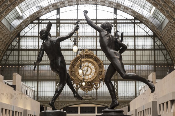 PARIS, FRANCE, MAY 29, 2022, Ornate clock at the main hall of famous museum d'Orsay in Paris, France