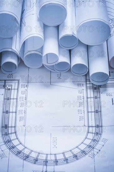 Variety of blueprint rolls construction concept