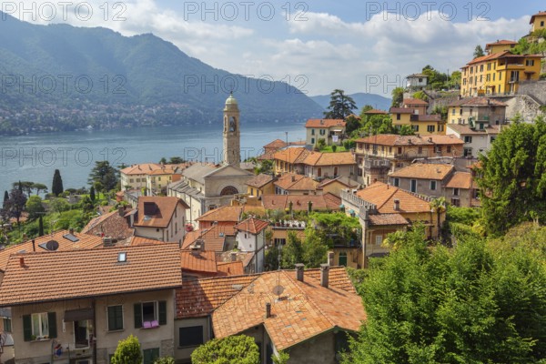 Old church in town at the coast of Como lake, Italy