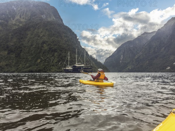 Canoeing through magnificent Doubtful Sound, South Island of New Zealand