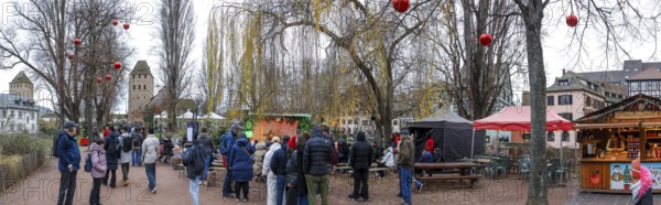 Panoramic photo Christmas market on the Louise-Weiss island square in the old town and the Heinrichsturm in the background, La Petite France, Strasbourg, Alsace, Département Bas-Rhin, France