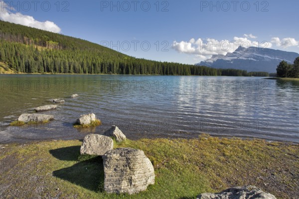 The evening wind drives an easy wave on mountain lake