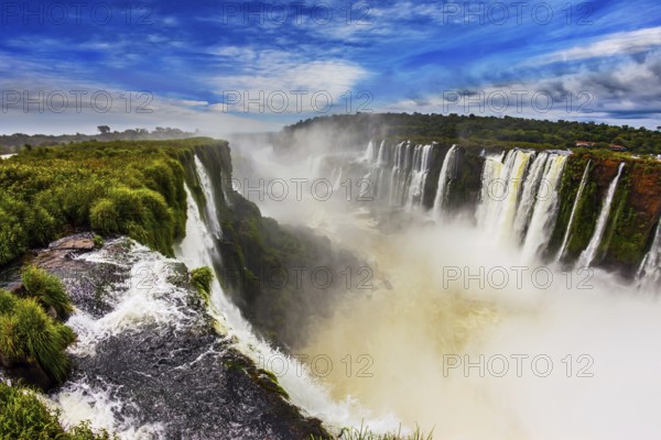 The full-flowing waterfall in the world on the Parana River. The Devil's throat /Garganta del Diablo/. Concept of extreme and active tourism