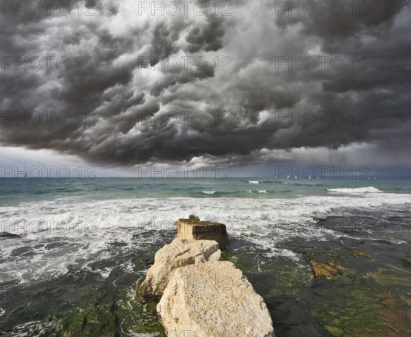 Severe storm cloud over the surf