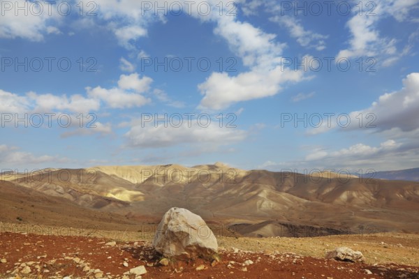 Gorgeous clear day in the Judean desert. Huge boulders along the roads, clear skies