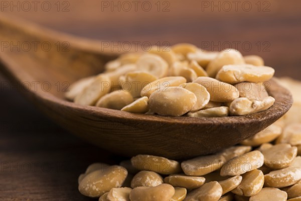 Broad bean dry on wooden table