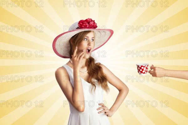 Creative vintage photo of a shocked pin up girl being treated with polka dot cup of hot tea or coffee on colourful abstract cartoon style background