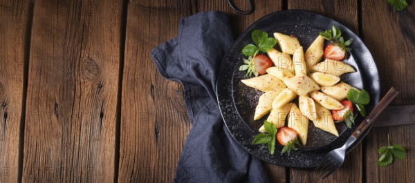 Kopytka Polish potato dumplings with strawberries