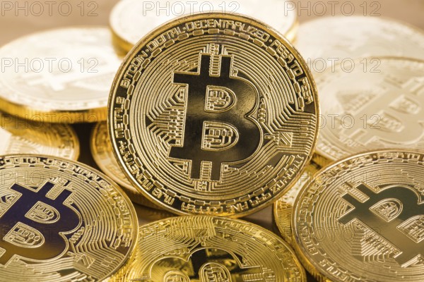 Bitcoins on a light background