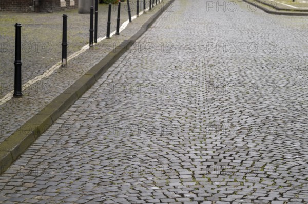Old cobbled street with pavement in germany