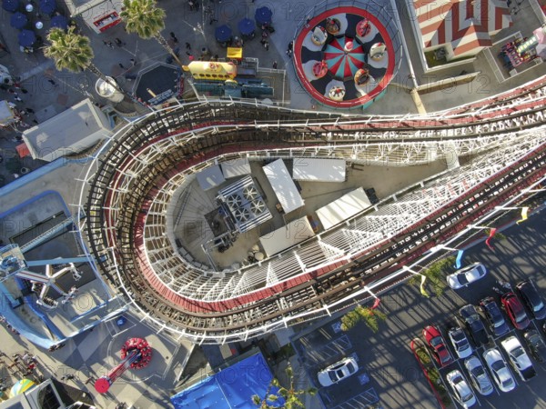 Aerial view of iconic Giant Dipper roller coaster in Belmont Park, an amusement park built in 1925 on the Mission Beach boardwalk, San Diego, California, USA. Old wood roller coaster July 13th, 2020