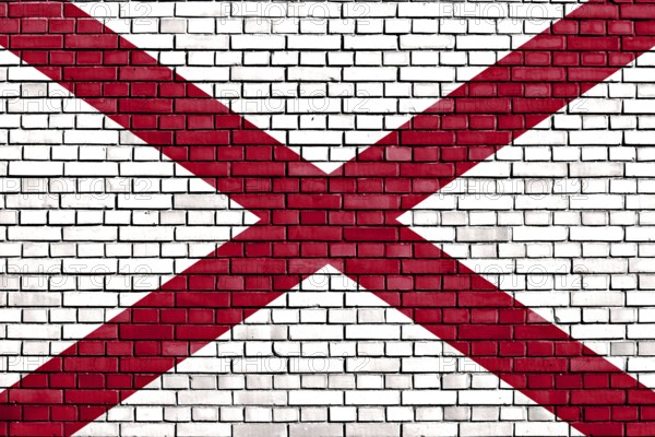 Flag of Alabama painted on brick wall