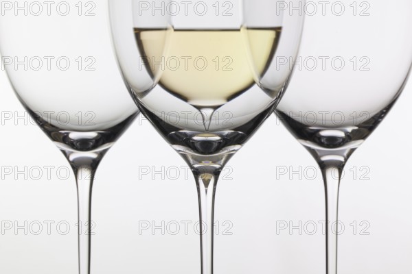 Four glasses of wine on the white background