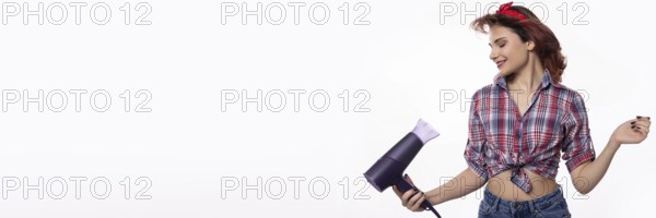 A fashionable woman is joyfully enjoying her hair styling routine infused with vibrant retro vibes all around