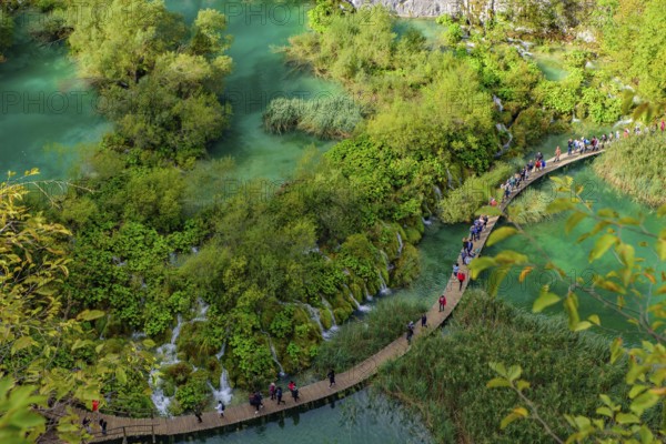 People walking on the trekking path at Plitvice Lakes National Park (Plitvi?ka Jezera), a national park in Croatia