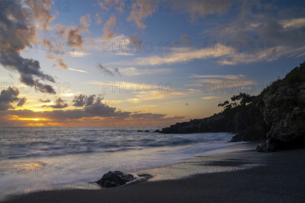 A view of the Marina di Maratea beach at sunset