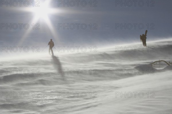 Skiers in snowstorm