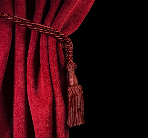 Red theatre curtain and red tassels